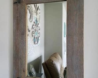 http mybarnwoodframes.com sweetwater-mirror-with-metal-brackets|View Rustic Mirrors by mybarnwoodframes on Etsy.